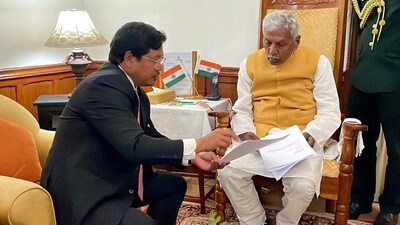National People's Party (NPP) chief Conrad K Sangma submits his resignation as chief minister of Meghalaya before governor Phagu Chauhan and stakes claim for forming a new government in the state, in Shillong on Friday. (ANI Photo) National People's Party (NPP) chief Conrad K Sangma submits his resignation as chief minister of Meghalaya before governor Phagu Chauhan and stakes claim for forming a new government in the state, in Shillong on Friday. (ANI Photo)