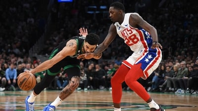 Brooklyn Nets forward Dorian Finney-Smith (28) defends Boston Celtics forward Jayson Tatum (0) during the first half at TD Garden. (USA TODAY Sports)