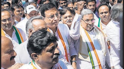 Congress leaders demanded the resignation of chief minister Basavaraj Bommai following the arrest of a government while accepting a bribe on behalf of his father who is a BJP MLA. (PTI) Congress leaders demanded the resignation of chief minister Basavaraj Bommai following the arrest of a government while accepting a bribe on behalf of his father who is a BJP MLA. (PTI)