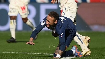 Paris Saint-Germain's Brazilian forward Neymar falls, injured after a contact (AFP)