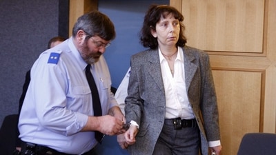 After killing her kids, Genevieve Lhermitte tried to commit suicide by stabbing herself but failed. (AFP) After killing her kids, Genevieve Lhermitte tried to commit suicide by stabbing herself but failed. (AFP)
