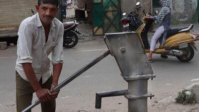 A man fills a bucket with water at a handpump at Ward No. 4, Dasna Town in Ghaziabad on Saturday. (Sakib Ali /HT Photo) A man fills a bucket with water at a handpump at Ward No. 4, Dasna Town in Ghaziabad on Saturday. (Sakib Ali /HT Photo)