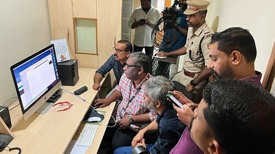 Police Crime Branch team conducts a raid at the Asianet News office as part of an investigation over allegedly running fake news, in Kozhikode on Sunday. (ANI Photo) Police Crime Branch team conducts a raid at the Asianet News office as part of an investigation over allegedly running fake news, in Kozhikode on Sunday. (ANI Photo)