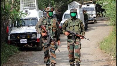 Army jawans walk towards the ‘encounter’ site in Amshipora area of Shopian on July 18, 2020. An army court has recommended life imprisonment for a captain in connection with the killing of three men in the ‘staged’ encounter. (ANI File Photo) Army jawans walk towards the ‘encounter’ site in Amshipora area of Shopian on July 18, 2020. An army court has recommended life imprisonment for a captain in connection with the killing of three men in the ‘staged’ encounter. (ANI File Photo)