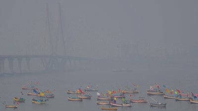 Mumbai, India - March 5, 2023: Boats are floating in the hazy weather near the Bandra worli sea link in Mumbai, India, on Sunday, March 5, 2023. (Photo by Satish Bate/ Hindustan Times) (Hindustan Times)