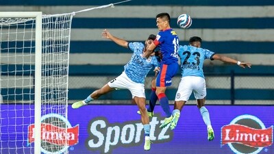 Mehtab Singh and Vignesh Dakshinamurthy of Mumbai City FC, Sunil Chhetri of Bengaluru FC in action during the league stage (PTI/File) Mehtab Singh and Vignesh Dakshinamurthy of Mumbai City FC, Sunil Chhetri of Bengaluru FC in action during the league stage (PTI/File)