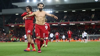 Mohamed Salah celebrates scoring Liverpool's sixth goal with Trent Alexander-Arnold (REUTERS)