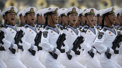 Soldiers from China's People's Liberation Army (PLA) Navy march in formation during a parade to commemorate the 70th anniversary of the founding of Communist China in Beijing, on October 1, 2019. (AP) Soldiers from China's People's Liberation Army (PLA) Navy march in formation during a parade to commemorate the 70th anniversary of the founding of Communist China in Beijing, on October 1, 2019. (AP)