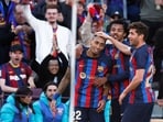 Soccer Football - LaLiga - FC Barcelona v Valencia - Camp Nou, Barcelona, Spain - March 5, 2023 FC Barcelona's Raphinha celebrates scoring their first goal with teammates REUTERS/Albert Gea