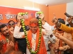 Tripura Chief Minister Manik Saha being garlanded by BJP supporters after the party's win in the assembly elections. (PTI) Tripura Chief Minister Manik Saha being garlanded by BJP supporters after the party's win in the assembly elections. (PTI)