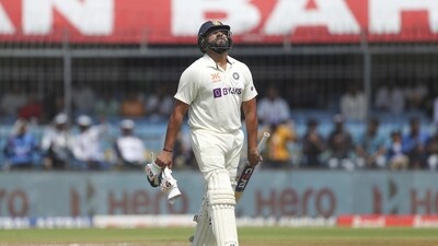 India's captain Rohit Sharma walks back to pavilion after his dismissal during the second day of third cricket test match between India and Australia in Indore, India, Thursday, March 2, 2023. (AP Photo/Surjeet Yadav) (AP)