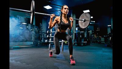 Lifting weights helps you achieve a toned body (Shutterstock) Lifting weights helps you achieve a toned body (Shutterstock)