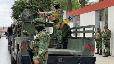 Mexican army soldiers prepare a search mission for four U.S. citizens kidnapped by gunmen in Matamoros, Monday. (AP) Mexican army soldiers prepare a search mission for four U.S. citizens kidnapped by gunmen in Matamoros, Monday. (AP)
