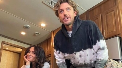 Sarah Shahi with Adam Demos.