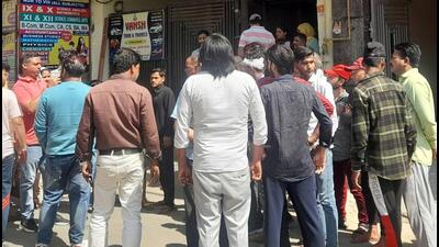Virat Mishra’s relatives outside his house. (Sakib Ali/HT Photo) Virat Mishra’s relatives outside his house. (Sakib Ali/HT Photo)