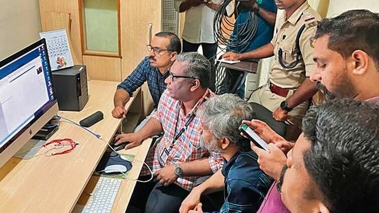 Police Crime Branch team conducts a raid at the Asianet News office as part of an investigation over allegedly running fake news, in Kozhikode on Sunday. (ANI)