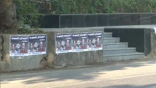 Posters targeting AAP leaders Manish Sisodia and Satyendar Jain put up outside AICC and Delhi Congress offices. (ANI)