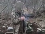 Russia-Ukraine war: A screenshot from the video purportedly showing the Ukrainian soldier before he was shot dead. Russia-Ukraine war: A screenshot from the video purportedly showing the Ukrainian soldier before he was shot dead.
