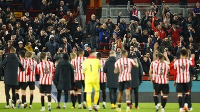 Brentford players gesture to their fans following the English Premier League soccer match between Brentford and Fulham (AP) Brentford players gesture to their fans following the English Premier League soccer match between Brentford and Fulham (AP)