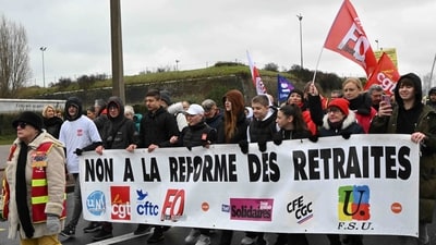 France protests: People hold a banner reading "Pensions reform : no !" during a rally in Dunkirk, northern France as part of a nationwide action day against French President's pension reform. (AFP)