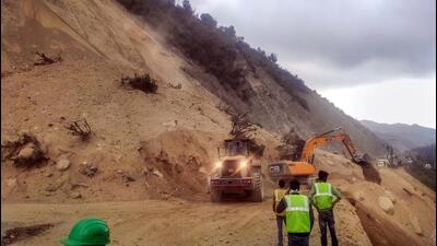 Land clearing operation underway at another site in Banihal on Tuesday. (PTI)
