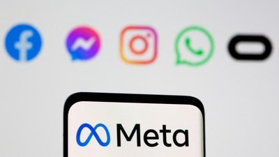 The Meta logo on smartphone in front of logo of Facebook, Messenger, Instagram, WhatsApp. (REUTERS)