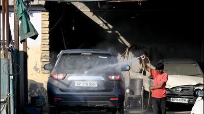 Officials said once the supply of recycled water to private car washing centres is ensured, the authority will likely ban the supply of fresh water for washing cars. (Sunil Ghosh/HT Photo)
