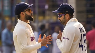 Indore: Indian captain Rohit Sharma with teammate Virat Kohli during the third day of the 3rd test cricket match between India and Australia, at Holkar Cricket Stadium in Indore, Friday, March 3, 2023. (PTI Photo/Ravi Choudhary)(PTI03_03_2023_000068A) (PTI) Indore: Indian captain Rohit Sharma with teammate Virat Kohli during the third day of the 3rd test cricket match between India and Australia, at Holkar Cricket Stadium in Indore, Friday, March 3, 2023. (PTI Photo/Ravi Choudhary)(PTI03_03_2023_000068A) (PTI)