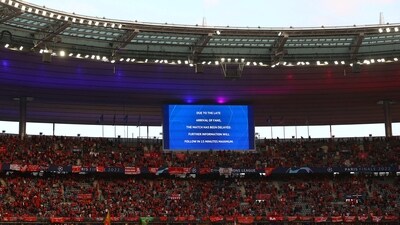 General view of a message displayed on a big screen inside the stadium before the match as kick off is delayed (REUTERS)