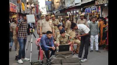 SP City Krishn Kumar Bishnoi monitoring photographs of drone camera at Ghanta Ghar in Gorakhpur on Tuesday (HT Photo) SP City Krishn Kumar Bishnoi monitoring photographs of drone camera at Ghanta Ghar in Gorakhpur on Tuesday (HT Photo)