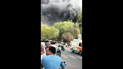 Smoke billowing from hte Jal Nigam office in Bahraich on Tuesday. (HT Photo)