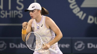 Iga Swiatek of Poland reacts during her WTA Dubai Duty Free Tennis Championship final match against Barbora Krejcikova of the Czech Republic (not pictured) in Dubai, on February 25, 2023. (Photo by Karim SAHIB / AFP) (AFP) Iga Swiatek of Poland reacts during her WTA Dubai Duty Free Tennis Championship final match against Barbora Krejcikova of the Czech Republic (not pictured) in Dubai, on February 25, 2023. (Photo by Karim SAHIB / AFP) (AFP)