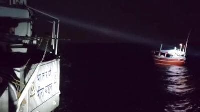 The boat and the five-member crew were taken into custody on Monday and brought to Okha for further investigation. (Twitter/sanghaviharsh)