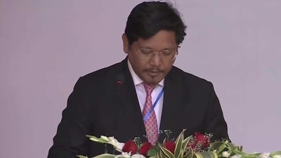 National People's Party (NPP) president Conrad K Sangma on Tuesday took oath as the chief minister of Meghalaya for the second consecutive term along with 11 members of his council of ministers. (Twitter/@ANI) National People's Party (NPP) president Conrad K Sangma on Tuesday took oath as the chief minister of Meghalaya for the second consecutive term along with 11 members of his council of ministers. (Twitter/@ANI)