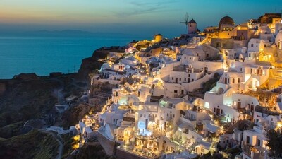 Santorini, Greece: Santorini is a stunning island in Greece, featuring picturesque villages, stunning beaches, and a vibrant nightlife. Spend your days exploring the charming villages, taking a sailing trip, or simply relaxing on the beach. Enjoy delicious Greek cuisine and take in the stunning views of the island. (Unsplash) Santorini, Greece: Santorini is a stunning island in Greece, featuring picturesque villages, stunning beaches, and a vibrant nightlife. Spend your days exploring the charming villages, taking a sailing trip, or simply relaxing on the beach. Enjoy delicious Greek cuisine and take in the stunning views of the island. (Unsplash)