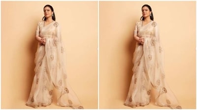 Kajol wore her tresses in straight locks and tied into a half ponytail and decked up in golden eyeshadow, black eyeliner, black kohl, mascara-laden eyelashes, contoured cheeks, a shade of nude lipstick and a big red bindi. (Instagram/@kajol) Kajol wore her tresses in straight locks and tied into a half ponytail and decked up in golden eyeshadow, black eyeliner, black kohl, mascara-laden eyelashes, contoured cheeks, a shade of nude lipstick and a big red bindi. (Instagram/@kajol)