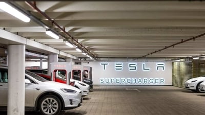 Electric automobiles charge at Tesla Inc. supercharger points at Ullevaal stadium in Oslo, Norway. (Bloomberg) Electric automobiles charge at Tesla Inc. supercharger points at Ullevaal stadium in Oslo, Norway. (Bloomberg)