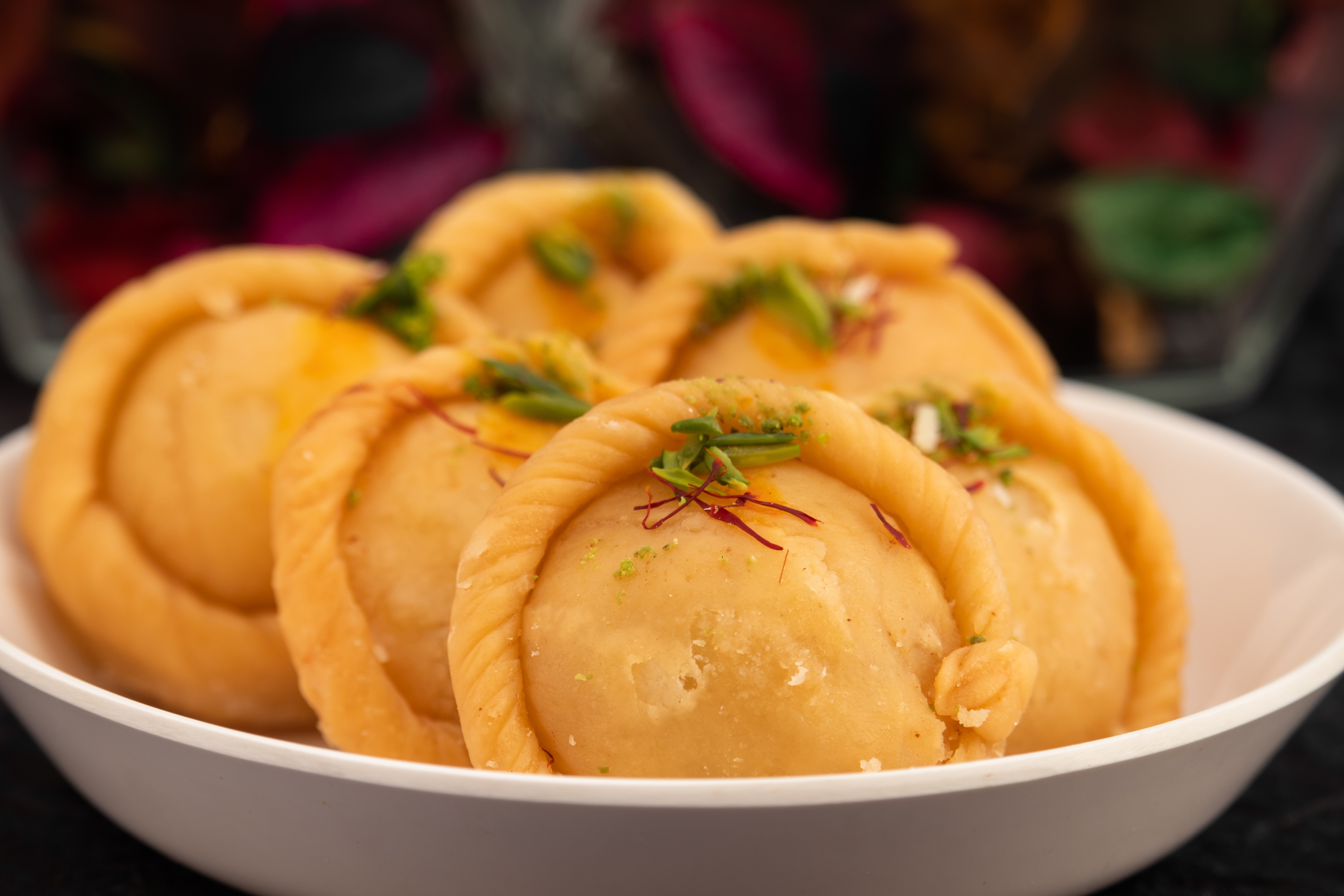 In Gujarat, they are called ghughras while it is known as karanji in Maharashtra and nevris in Goa (Shutterstock) In Gujarat, they are called ghughras while it is known as karanji in Maharashtra and nevris in Goa (Shutterstock)