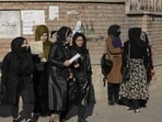 Afghan women students stand outside the Kabul University in Kabul Afghan women students stand outside the Kabul University in Kabul