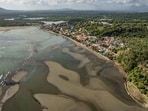 An aerial view shows the oil spill from the sunken fuel tanker MT Princess Empress on the shores of Pola, in Oriental Mindoro province, Philippines, March 8, 2023. Tourism in Philippine province hit by oil spill, tourists cancel reservations in peak season 