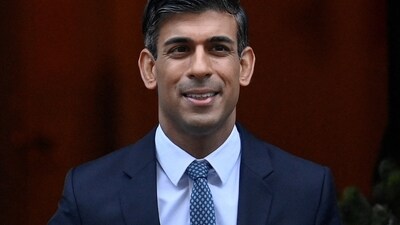 Rishi Sunak: British Prime Minister Rishi Sunak walks outside Downing Street. (Reuters)