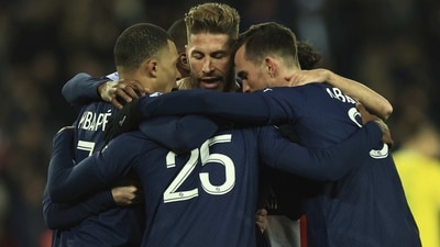 PSG's Lionel Messi celebrates with teammates after scoring his side's opening goal (AP)