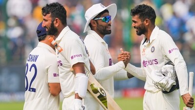 Cheteshwar Pujara and Srikar Bharat greet teammates after the end of 2nd Test between India and Australia at the Arun Jaitley Stadium in New Delhi (PTI) Cheteshwar Pujara and Srikar Bharat greet teammates after the end of 2nd Test between India and Australia at the Arun Jaitley Stadium in New Delhi (PTI)