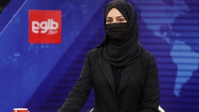 A female presenter for Tolo News, Khatereh Ahmadi, works in a newsroom at Tolo TV station in Kabul, Afghanistan, (File/Reuters) A female presenter for Tolo News, Khatereh Ahmadi, works in a newsroom at Tolo TV station in Kabul, Afghanistan, (File/Reuters)