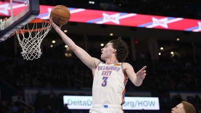 Oklahoma City Thunder guard Josh Giddey (3) goes to the basket in front of Golden State Warriors guard Donte DiVincenzo, right, in the second half of an NBA basketball game Tuesday, (AP) Oklahoma City Thunder guard Josh Giddey (3) goes to the basket in front of Golden State Warriors guard Donte DiVincenzo, right, in the second half of an NBA basketball game Tuesday, (AP)