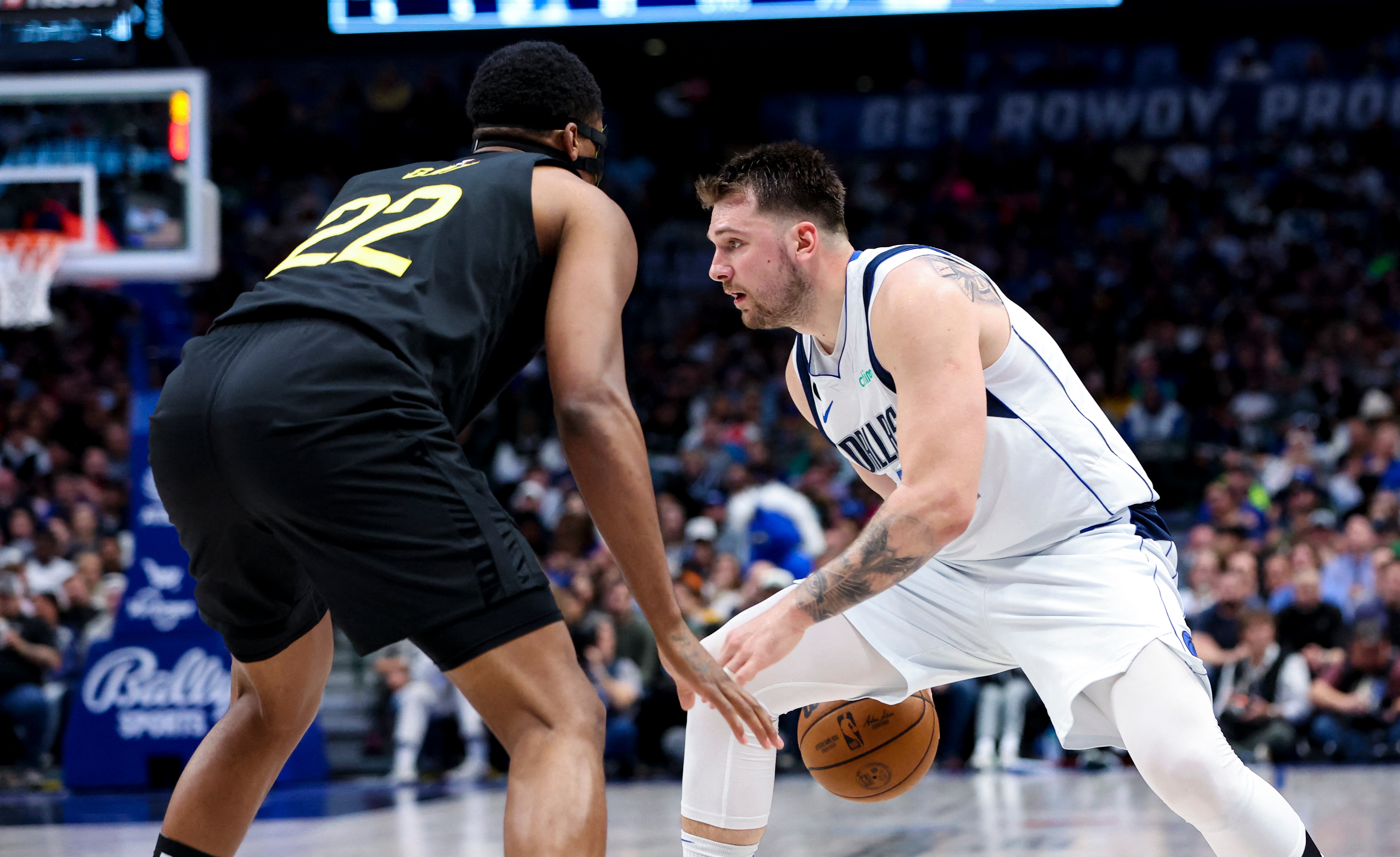 Dallas Mavericks guard Luka Doncic (77) dribbles as Utah Jazz forward Rudy Gay (22) defends during the second half at American Airlines Center. (USA TODAY Sports)