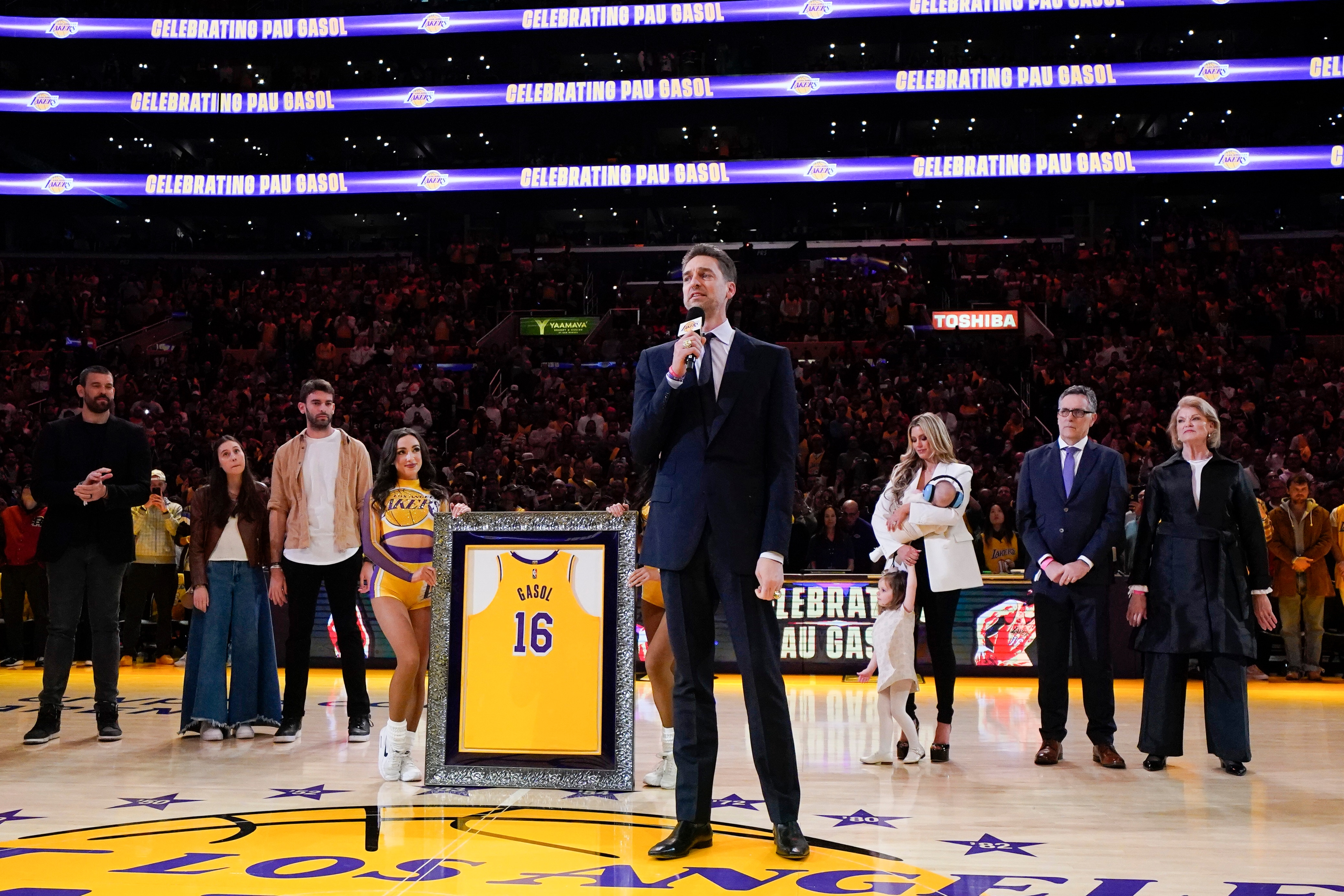Former Los Angeles Lakers forward Pau Gasol speaks during his jersey retirement ceremony at halftime of the team's NBA basketball game against the Memphis Grizzlies Tuesday, (AP) Former Los Angeles Lakers forward Pau Gasol speaks during his jersey retirement ceremony at halftime of the team's NBA basketball game against the Memphis Grizzlies Tuesday, (AP)
