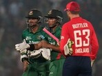 England's captain Jos Buttler, right, walks to greet Bangladesh's captain Shakib Al Hasan England's captain Jos Buttler, right, walks to greet Bangladesh's captain Shakib Al Hasan