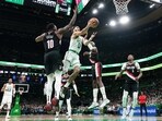 Boston Celtics forward Jayson Tatum (0) drives to the basket against the Portland Trail Blazers in the second half at TD Garden.
