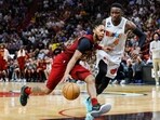 Cleveland Cavaliers guard Darius Garland (10) drives to the basket as Miami Heat guard Victor Oladipo (4) defends during the fourth quarter at Miami-Dade Arena.